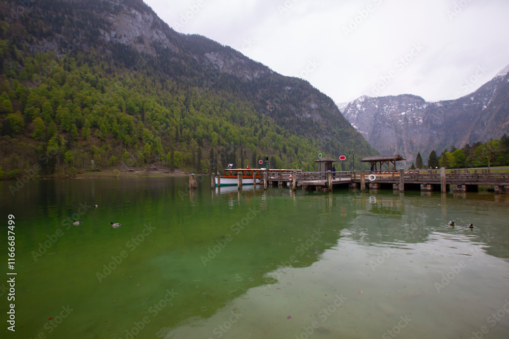 Königssee, the famous lake at the foot of Mount Watzmann is a natural kingdom in Berchtesgaden. Königssee, the famous lake at the foot of Mount Watzmann is a natural kingdom in Berchtesgaden.