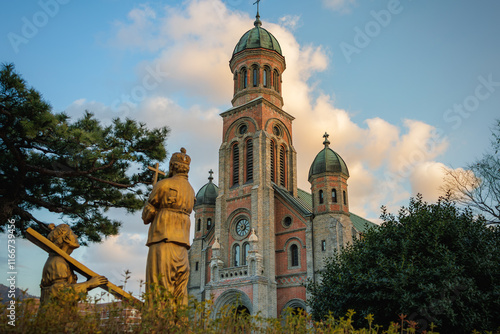 The Jeondong Cathedral and trees at sunset, In South Korea, Jeonju photo