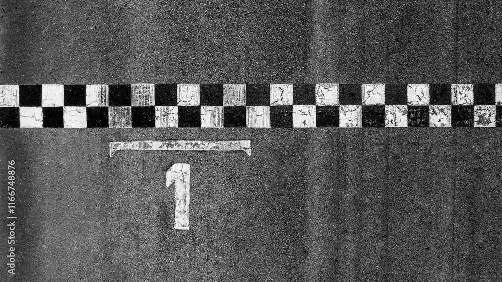 Obraz premium Aerial view race grid start, Start and finish line race track background top view, Start and finish of track racing asphalt road.