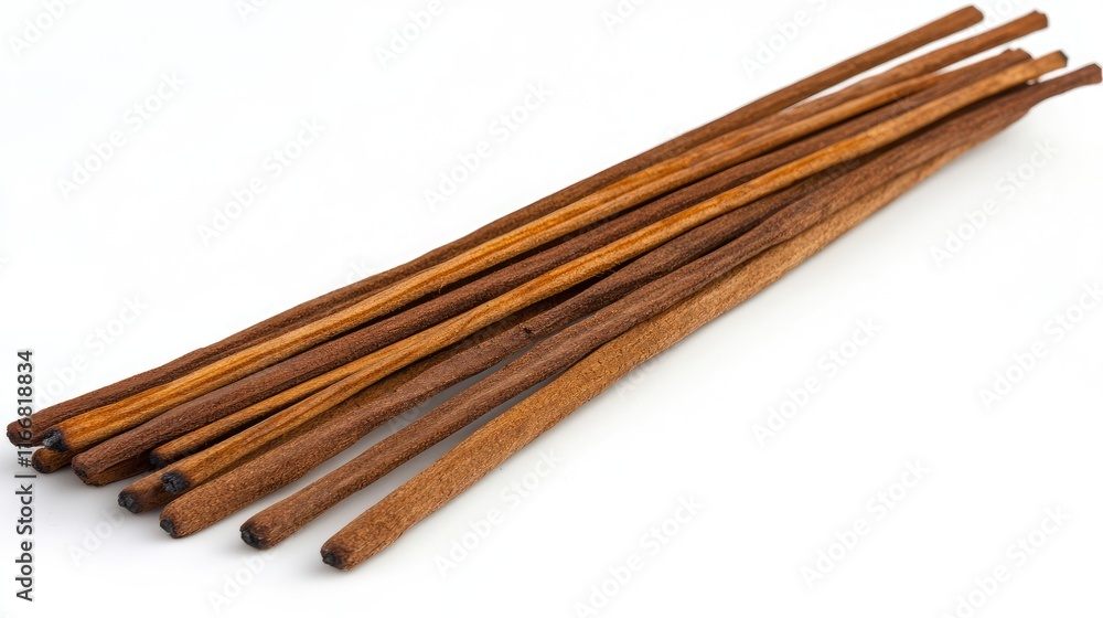 Aromatic incense sticks grouped together on a white background for relaxation and meditation purposes Aromatic incense sticks grouped together on a white background for relaxation and meditation purposes