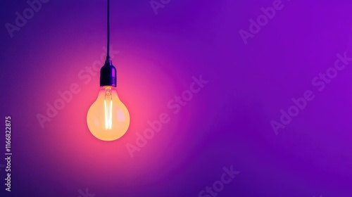 Hanging Light Bulb Illuminating Vibrant Purple Wall for Modern Neon Aesthetic Background with Space for Text or Design Elements photo