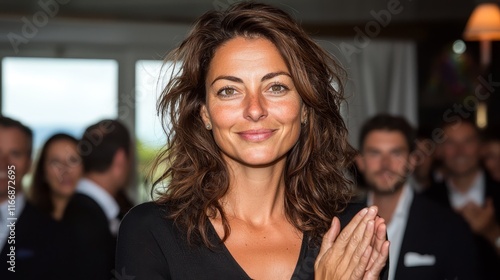 Wallpaper Mural A woman in a black dress clapping her hands Torontodigital.ca