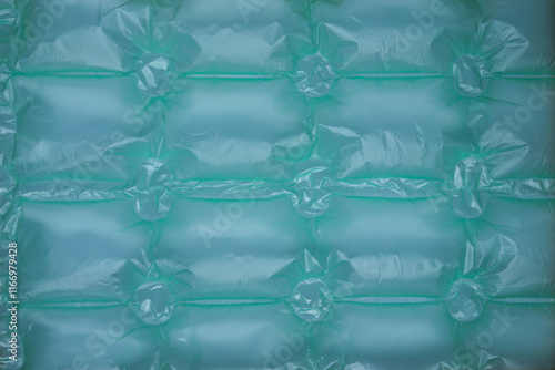 Close up of green plastic bubble wrap texture background. Use for backdrop or wallpaper