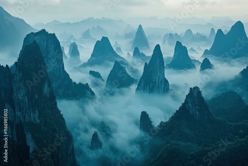 Wallpaper Mural The mountains of China cover the sky, with dense fog and mist floating within. The distant view is vast. It features high-definition photography style, layered composition, and blue tones. Torontodigital.ca