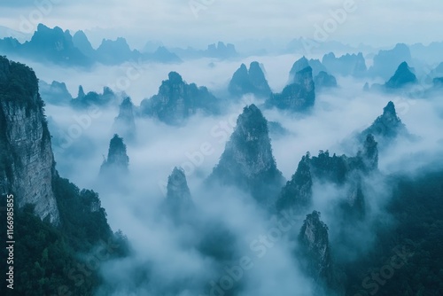 The mountains of China cover the sky, with dense fog and mist floating within. The distant view is vast. It features high-definition photography style, layered composition, and blue tones. photo