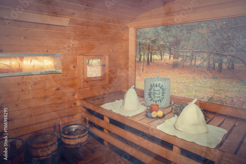 Finnish sauna for relaxation. interior of a Finnish sauna with hot tea and a birch broom