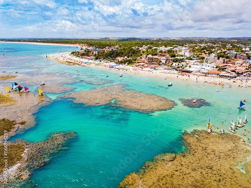 Porto de Galinhas - aerial view of the natural pools of Porto de Galinhas at low tide full of rafts