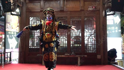 Experience the art of Sichuan opera face changing in a live performance from Chengdu