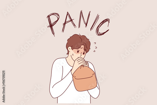 Panic attack in man breathing into paper bag to overcome fear and restore calm. Problem of panic attack for guy who needs sedative and antidepressants to relieve stress and depression