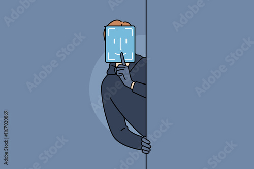 Hacker with fake facial biometrics wants to commit fraudulent actions for log into protected system. Hacker uses false identity to hack identification system and gain access confidential information