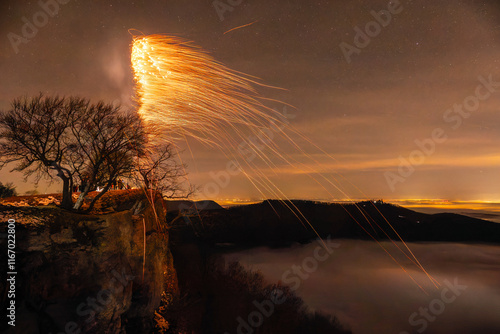 Silvester Feuerwerk 2024, Auf dem Breitenstein, Schwäbische Alb bei Ochsenwang. Nebelmeer im Albvorland. Blick zur Burg Teck bei Kirchheim unter Teck photo