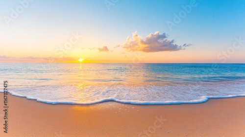 Serene beach at sunset with gentle waves and colorful sky.