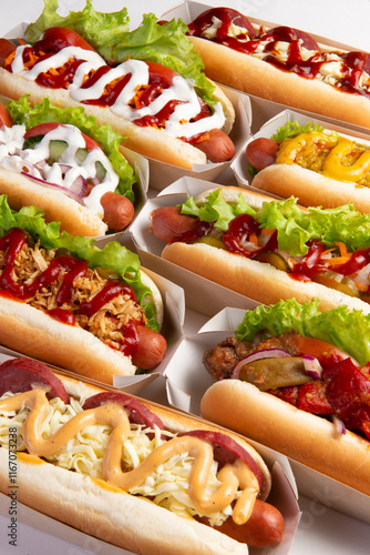 Assorted different hot dogs on a light background. photo