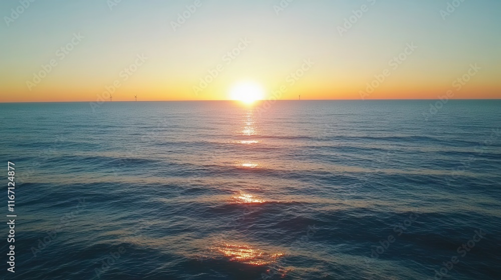 Fototapeta premium Panoramic Ocean Sunset with Wind Turbines