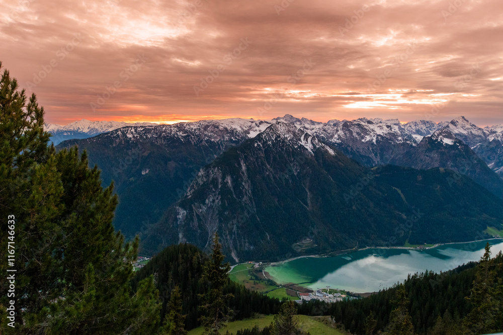 Fototapeta premium Fiery Sunset Over Achensee: Mountain Panorama