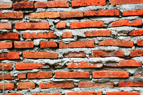 Red brick wall.
Tembok bata merah.