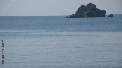 landscape of little island and sea at Mae pim cape beach in Thailand    photo