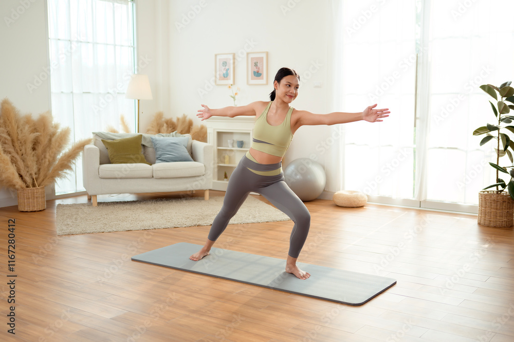 Fototapeta premium Asian woman in sportswear exercising and doing yoga