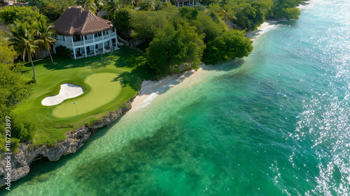 Aerial view of a luxurious golf course set against turquoise coastal waters, showcasing an idyllic scene of recreational bliss and natural beauty. 