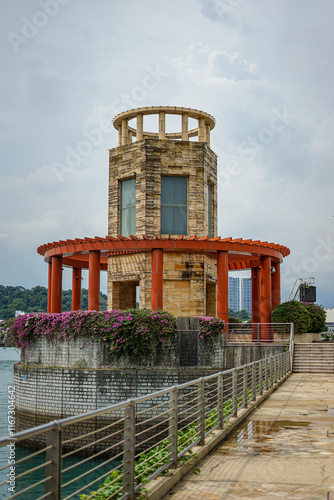 Singapore, Asia, a clock tower on top of a wooden fence