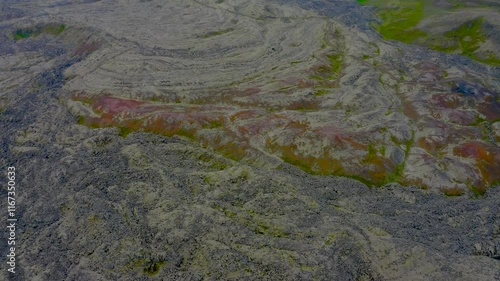 Aerial view of old lava rocks formations and lakes in the highlands of Selvallafoss waterfall area, Iceland. photo