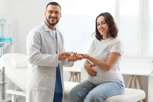 Young pregnant woman with d...