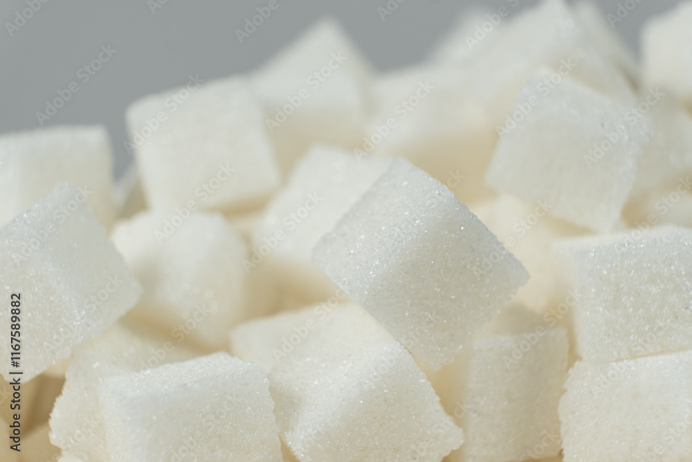 Cubes of white crystalline beetroot refined sugar. Cubes of white crystalline beetroot refined sugar.