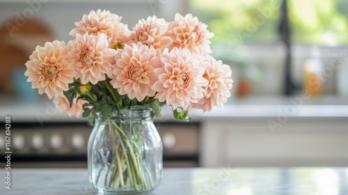 Beautiful bouquet of pink dahlias in a cozy kitchen setting with soft morning...