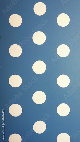 Blue wall adorned with playful white circles creating a cheerful atmosphere f...