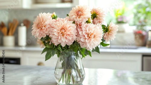 Beautiful bouquet of pink dahlias in a cozy kitchen setting with soft morning...