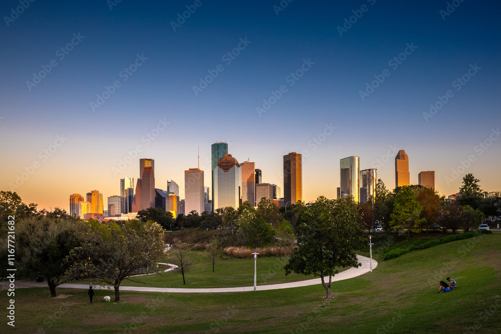Obraz premium Houston Downtown modern business city with skyscraper city scape with park view from Buffalo Bayou center of Houston city, Texas, United States of America, US at sunset time
