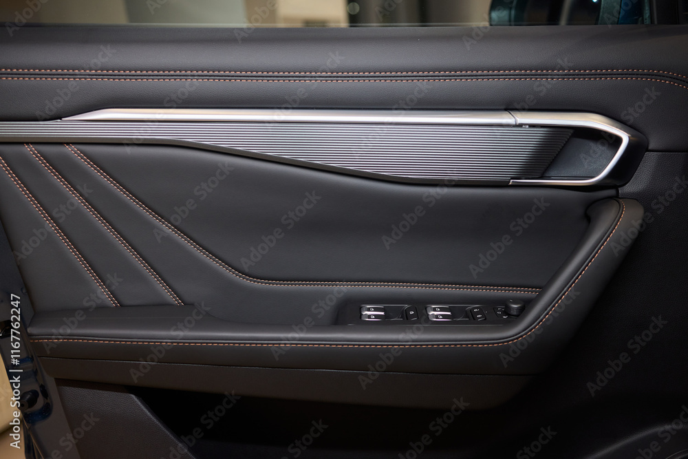 A car door with trim showcasing automotive design details A car door with trim showcasing automotive design details