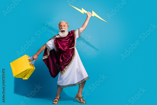 Photo of crazy man wear costume powerful mythological god isolated on blue color background photo