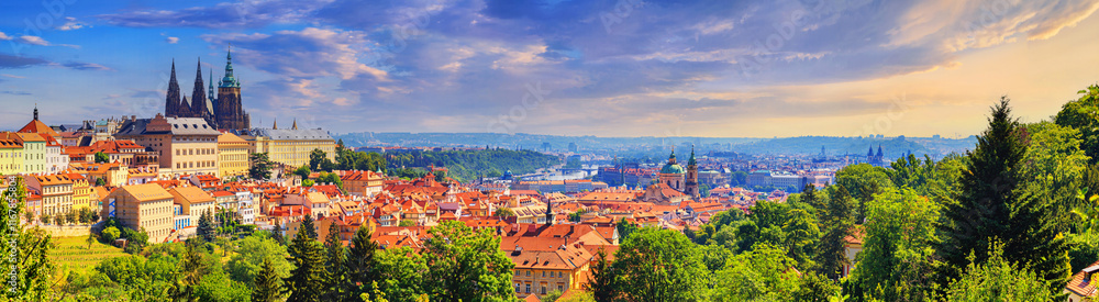 Summer cityscape, panorama, banner - view of the Hradcany historical district of Prague and castle complex Prague Castle, Czech Republic