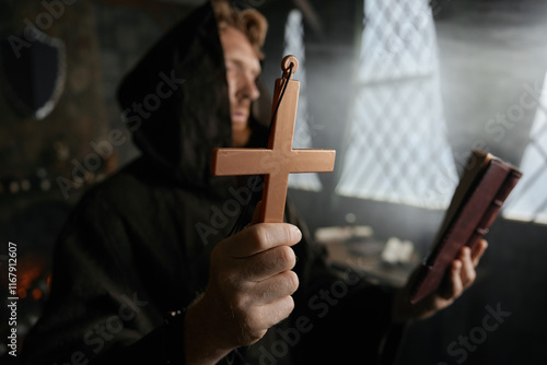 Cuadro en lienzo Priest holding cross and holy bible performing exorcism rite