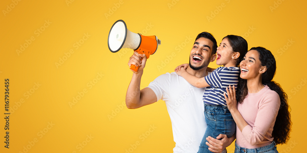 Amazing Offer. Happy Middle Eastern Family Of Three Making Announcement With Loudspeaker, Joyful Arab Parents And Little Daughter Shouting With Megaphone Over Yellow Background, Panorama, Copy Space Amazing Offer. Happy Middle Eastern Family Of Three Making Announcement With Loudspeaker, Joyful Arab Parents And Little Daughter Shouting With Megaphone Over Yellow Background, Panorama, Copy Space