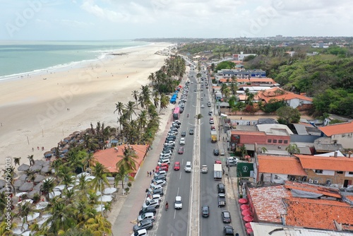 Vista aérea por drone da praia do caolho em são luis do maranhão no Brasil com a avenida no centro photo