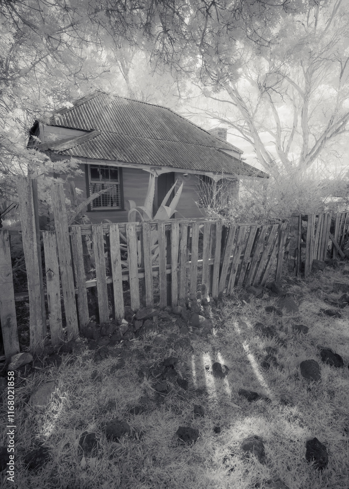 Rustic, old and abandoned farm cottage in black and white, Australia