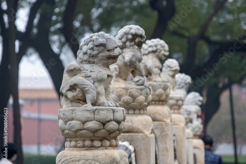 Stone lion sculptures on the bridge inside the Forbidden city, photo