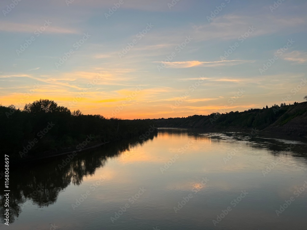 Obraz premium sunset over the river
