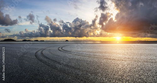 Obraz na płótnie Asphalt road square and beautiful coastline with sky clouds nature landscape at sunset in Zhuhai, China. Outdoor asphalt parking lot. w salonie