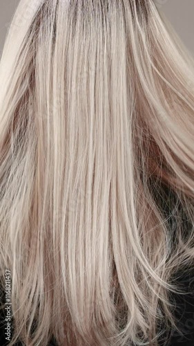 Wallpaper Mural Vertical slow motion video of unrecognizable model with long blond straight hair Torontodigital.ca