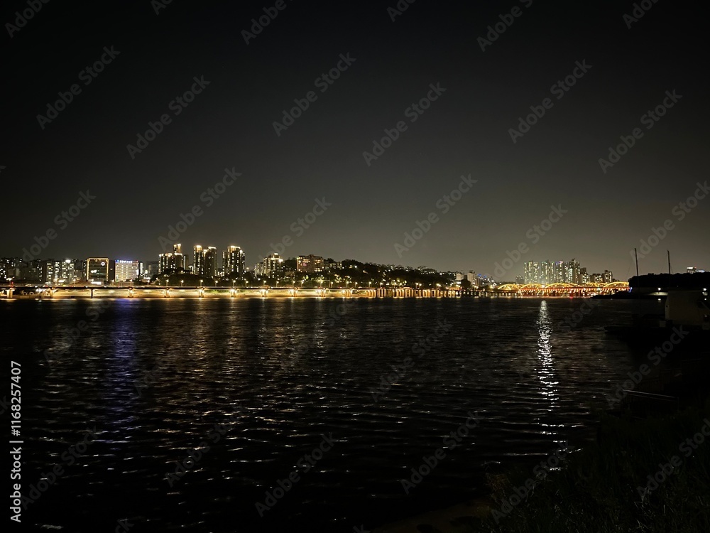 Urban riverside at nighttime Urban riverside at nighttime