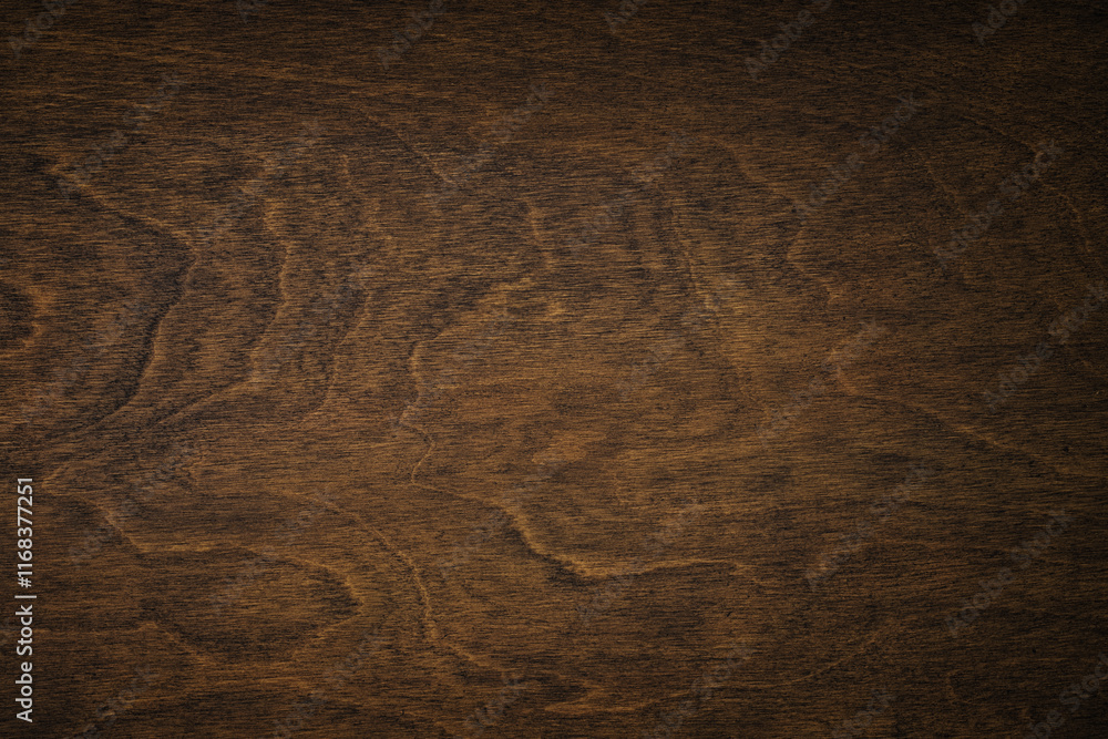 Naklejka premium brown boards as a template for design. dark wood texture backdrop