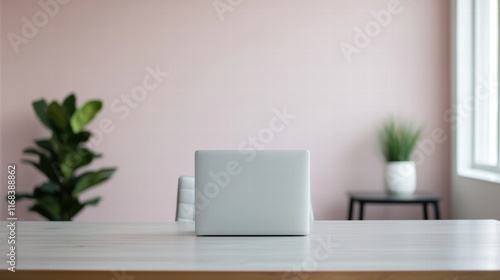Wallpaper Mural Closed laptop stands on desk in modern workspace with cozy decor Torontodigital.ca