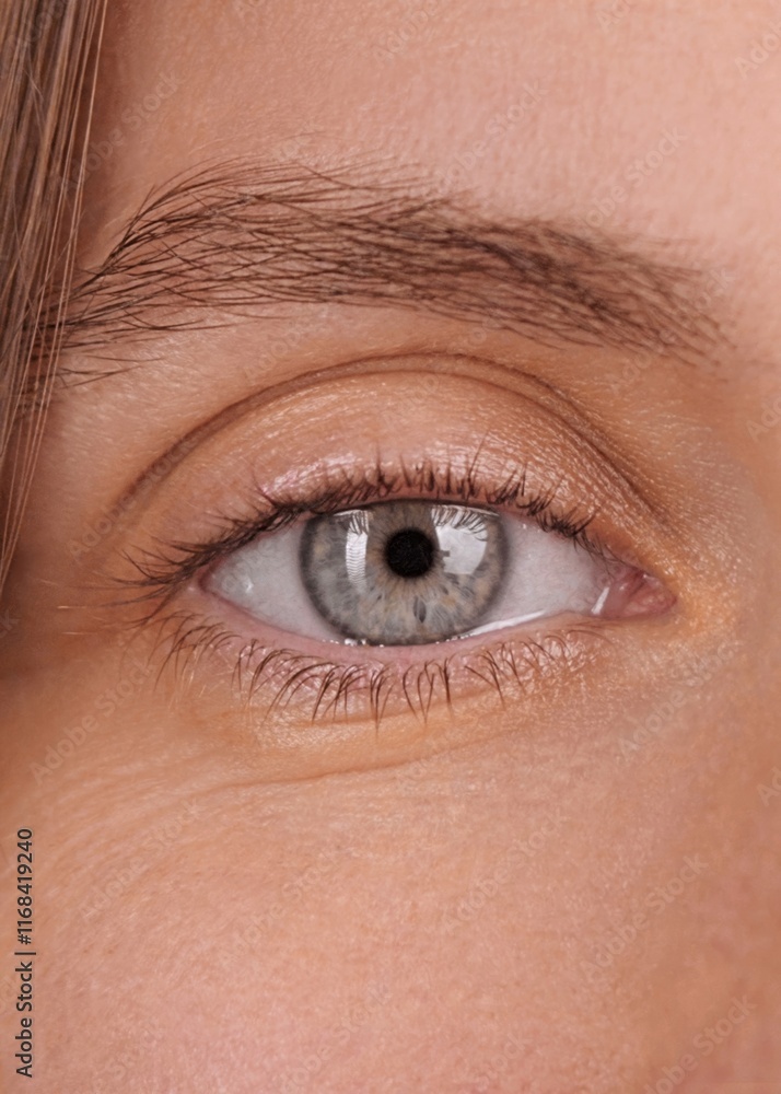 Obraz premium Vertical Screen. Gaze. Beautiful blue eye of smiling woman looking at camera. Extreme close-up of female eye, happy optimistic view. Macro eye. Beautiful people. Concept of joy, hope, inspiration.