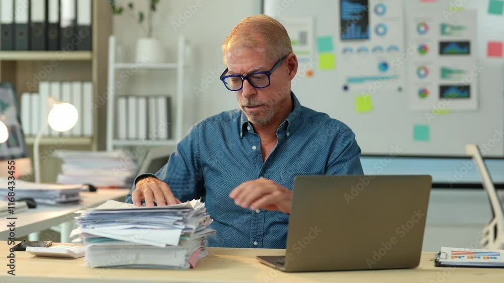 Professional businessman experiencing intense emotional spectrum while analyzing critical documents and navigating workplace challenges on laptop in contemporary corporate setting Professional businessman experiencing intense emotional spectrum while analyzing critical documents and navigating workplace challenges on laptop in contemporary corporate setting