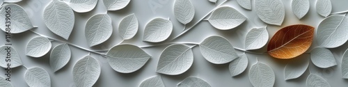 3D decorative wall design with a modern leaf pattern in neutral tones, featuring a standout bronze-colored leaf.

