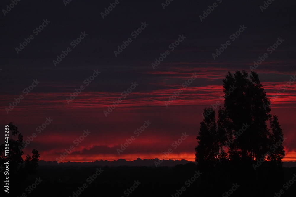 Obraz premium Orange sunset and clouds