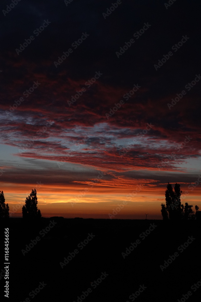 Fototapeta premium Orange sunset and clouds
